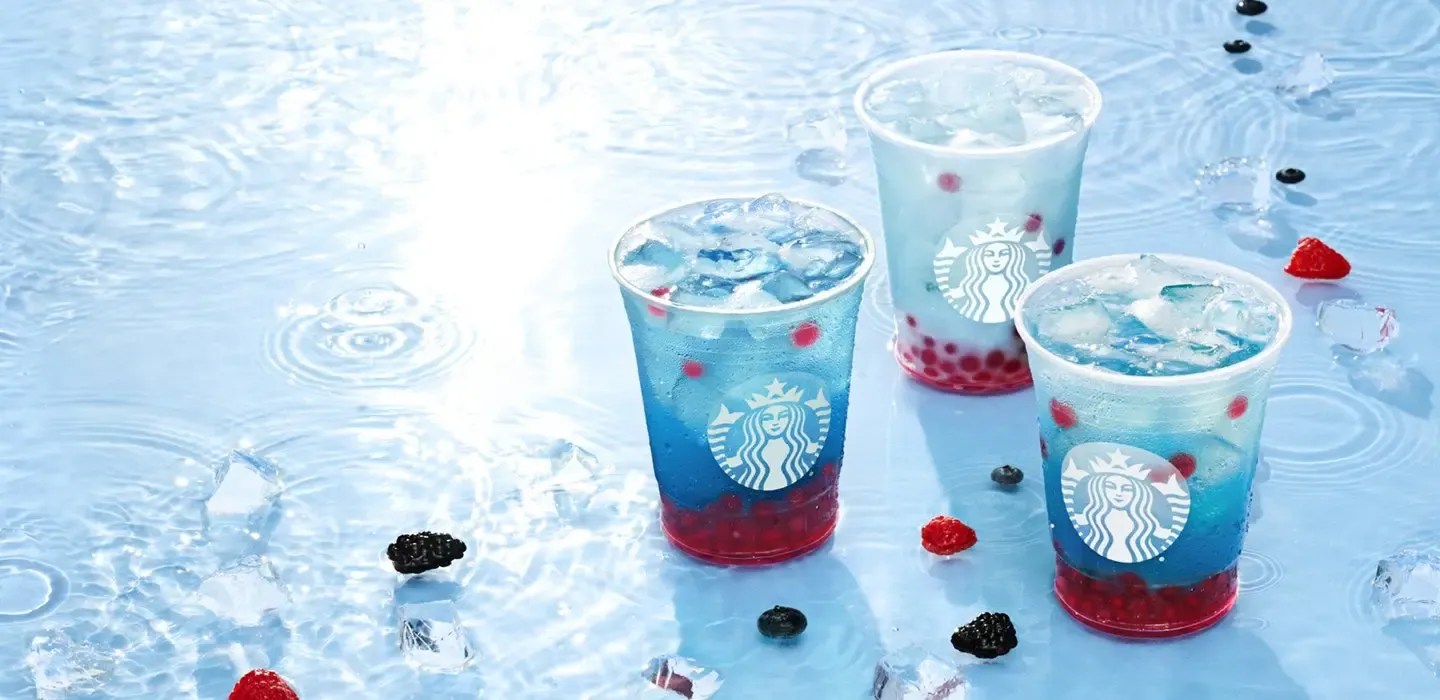 Starbucks Summer Berry Refreshers beverages, blue drinks with red pearls.