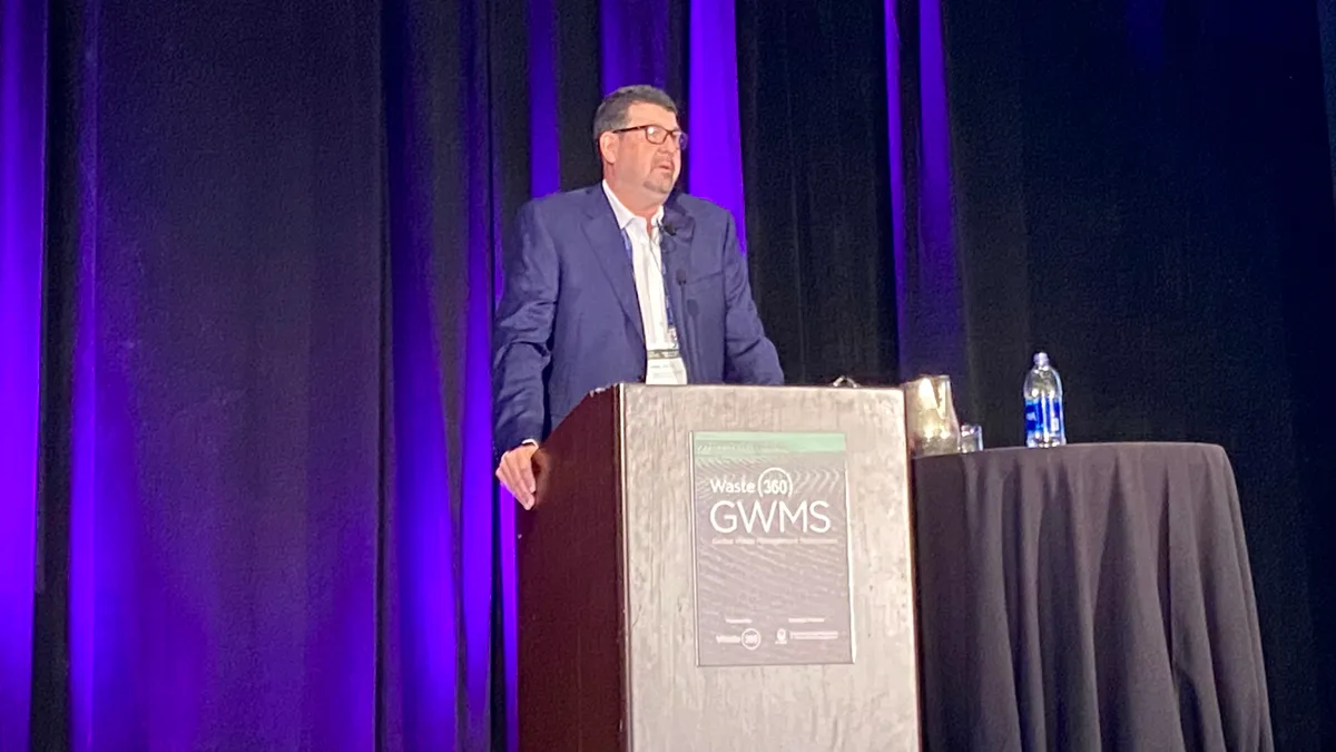 Waste Connections' James Little delivering keynote speech at 2022 Global Waste Management Symposium in Indian Wells, California.