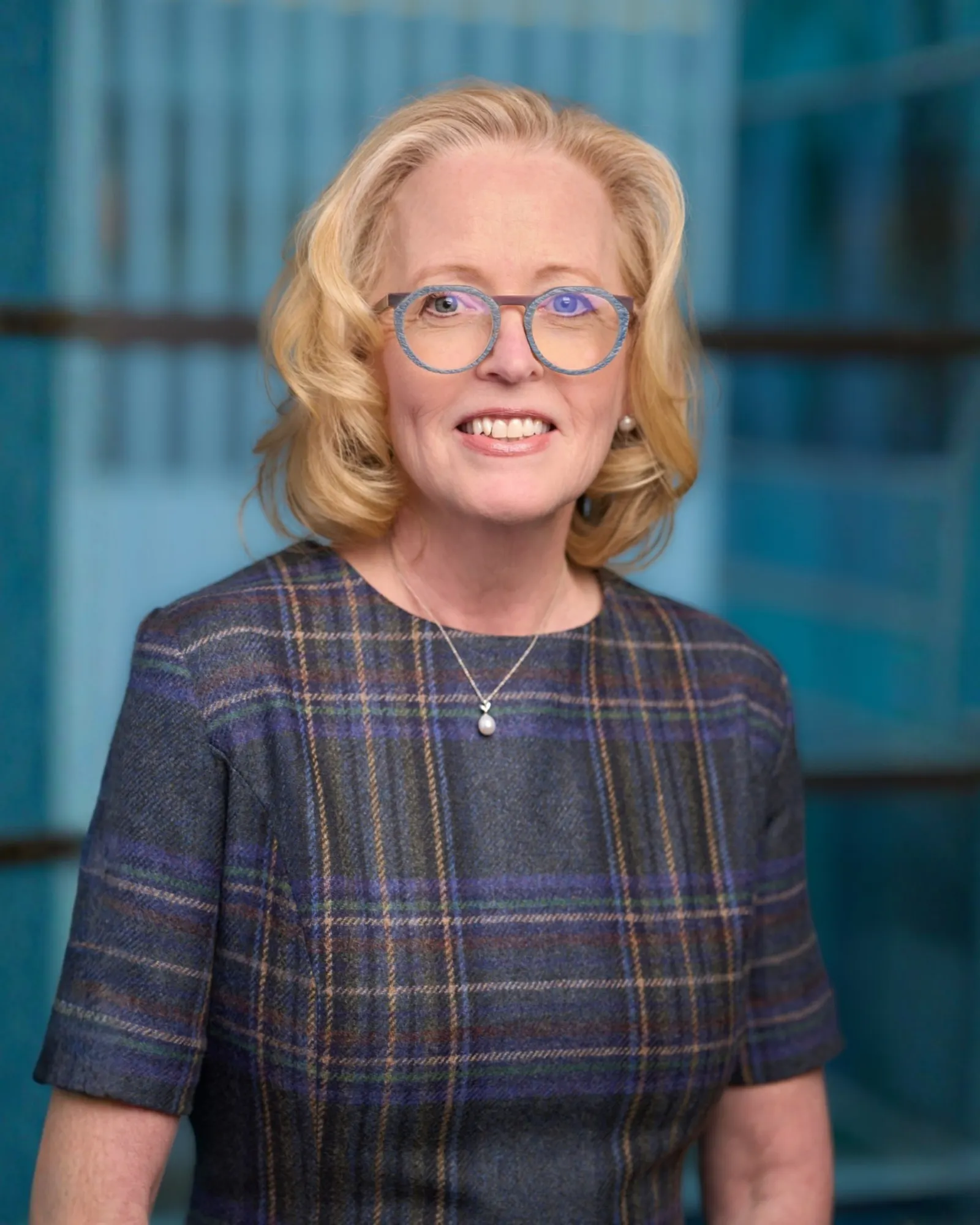 A headshot of Robin Kramer, chief financial officer of Biogen.