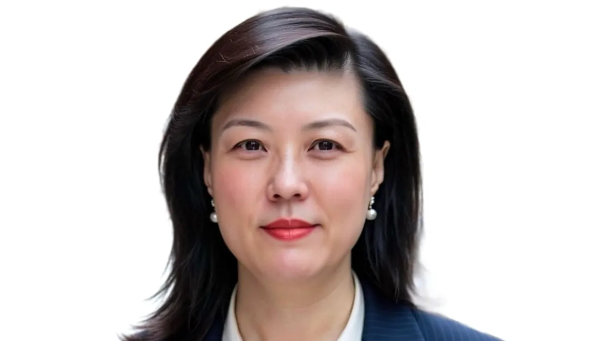 A headshot of Julia Wang, Labcorp's incoming CFO.