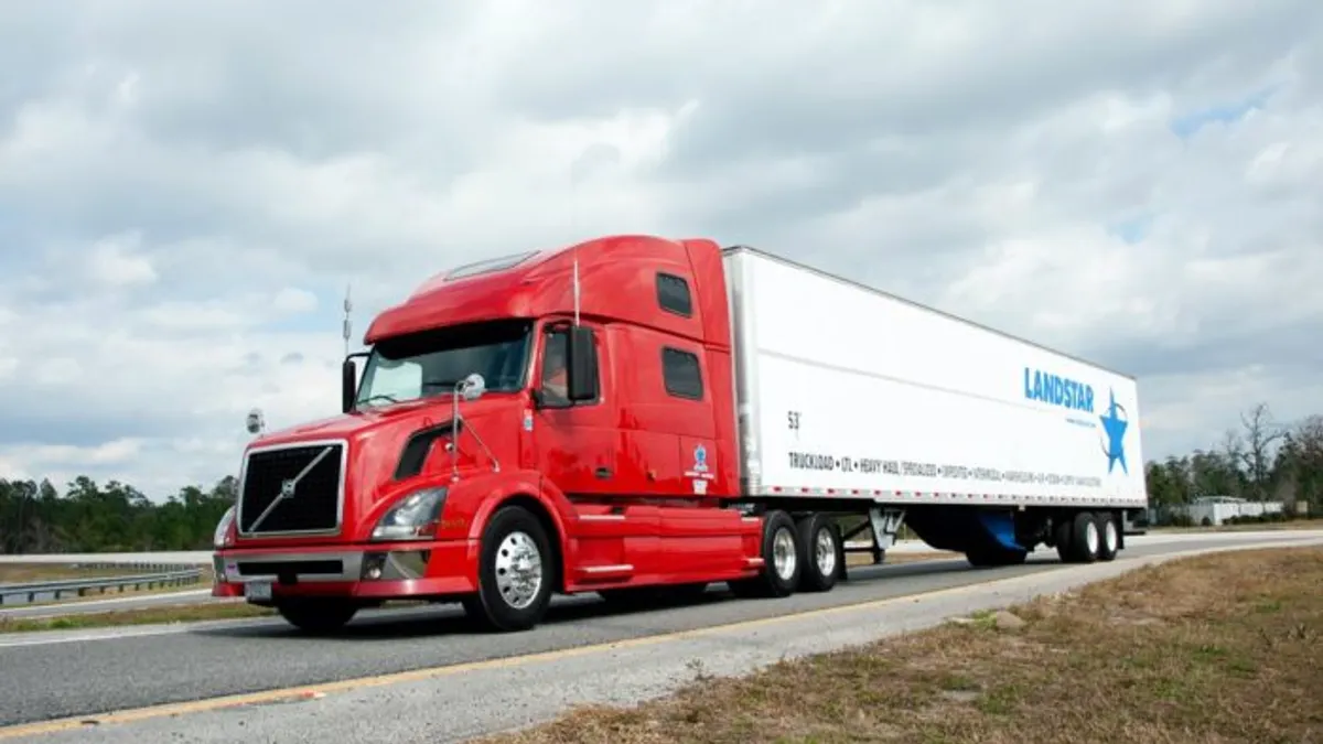 A freight truck n the road.