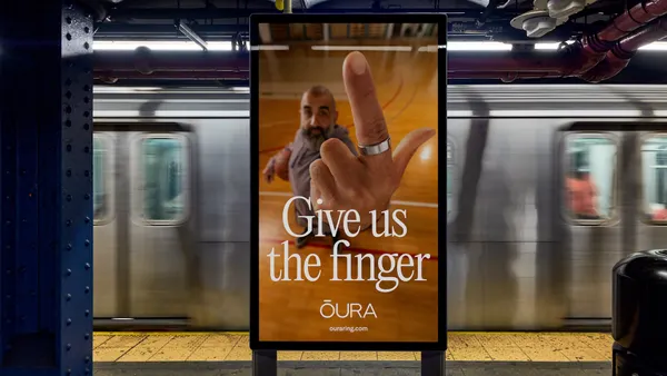 An Oura out-of-home ad in a subway