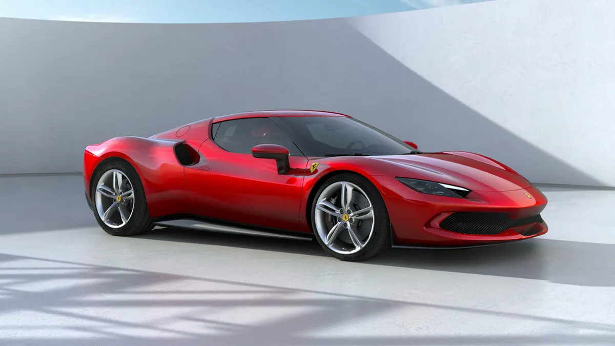 A media photo of a red Ferrari 296 GTB sports car.