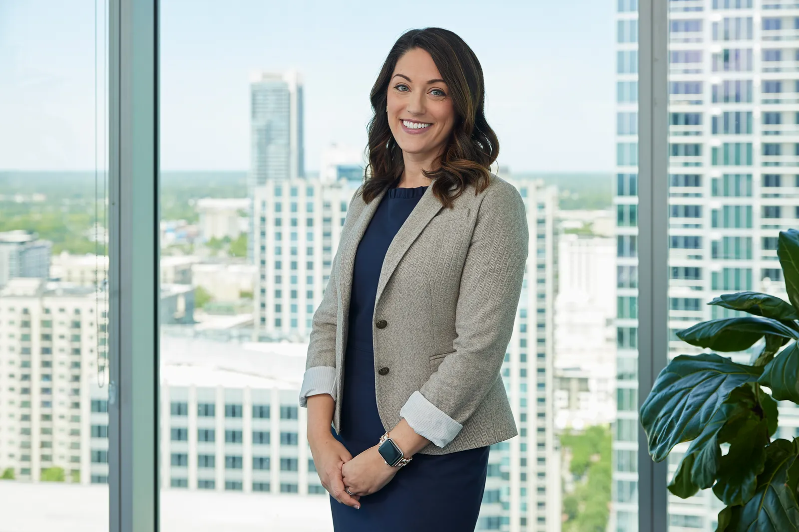 Jennifer Sanctis, a Bank of America managing director, wears a gray jacket