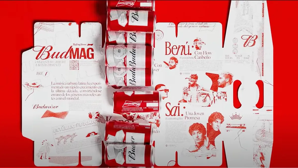 An opened 12-pack package of Budweiser beer with a music magazine printed on the package's inside.