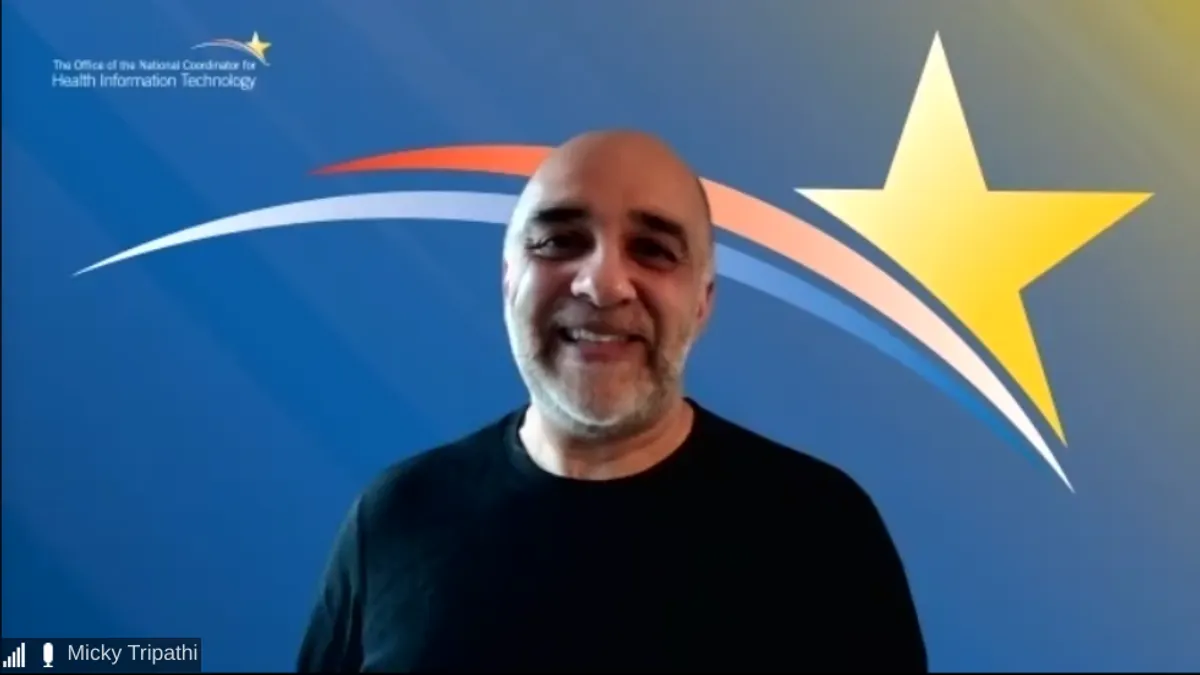 Micky Tripathi speaks remotely at the Health IT Leadership Roundtable March 11, 2021