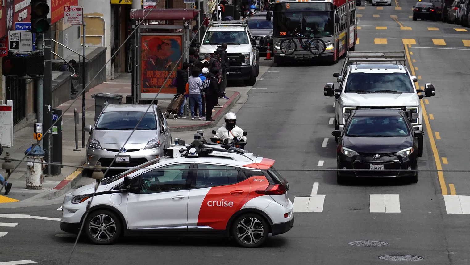 A Chevrolet Cruise autonomous vehicle with a driver moves through an intersection on June 08, 2023 in San Francisco, California.