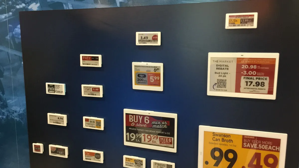 Digital price tags on display in a trade show booth