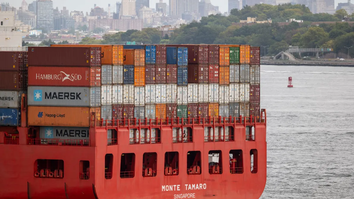 A full container vessel transiting through the New York harbor.