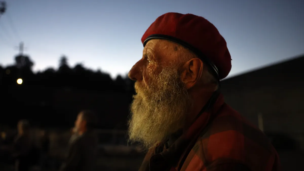 A person wearing a red beret.