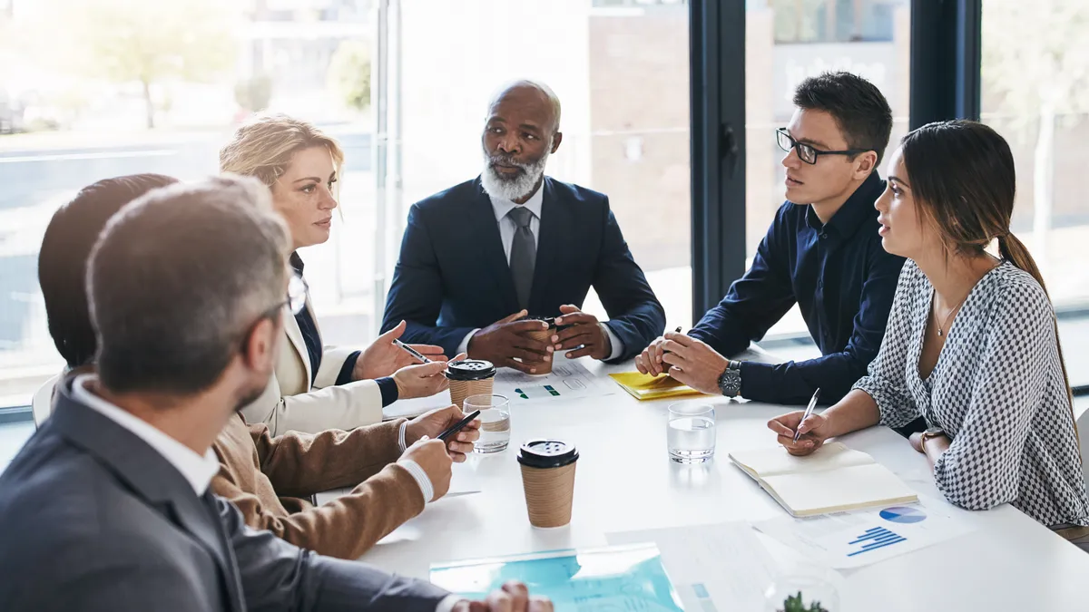 Shot of a group of businesspeople having a meeting in an office