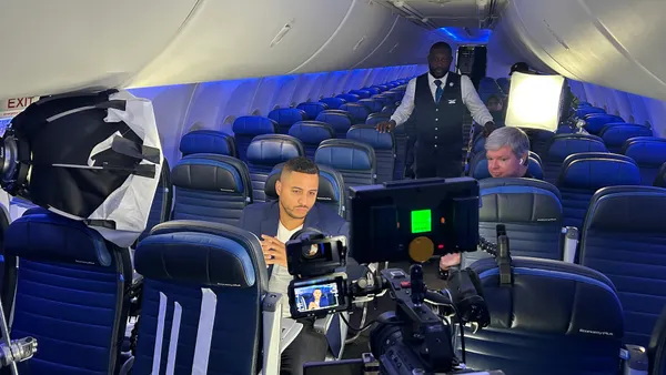 ESPN host Tyler Fulghum on a United flight