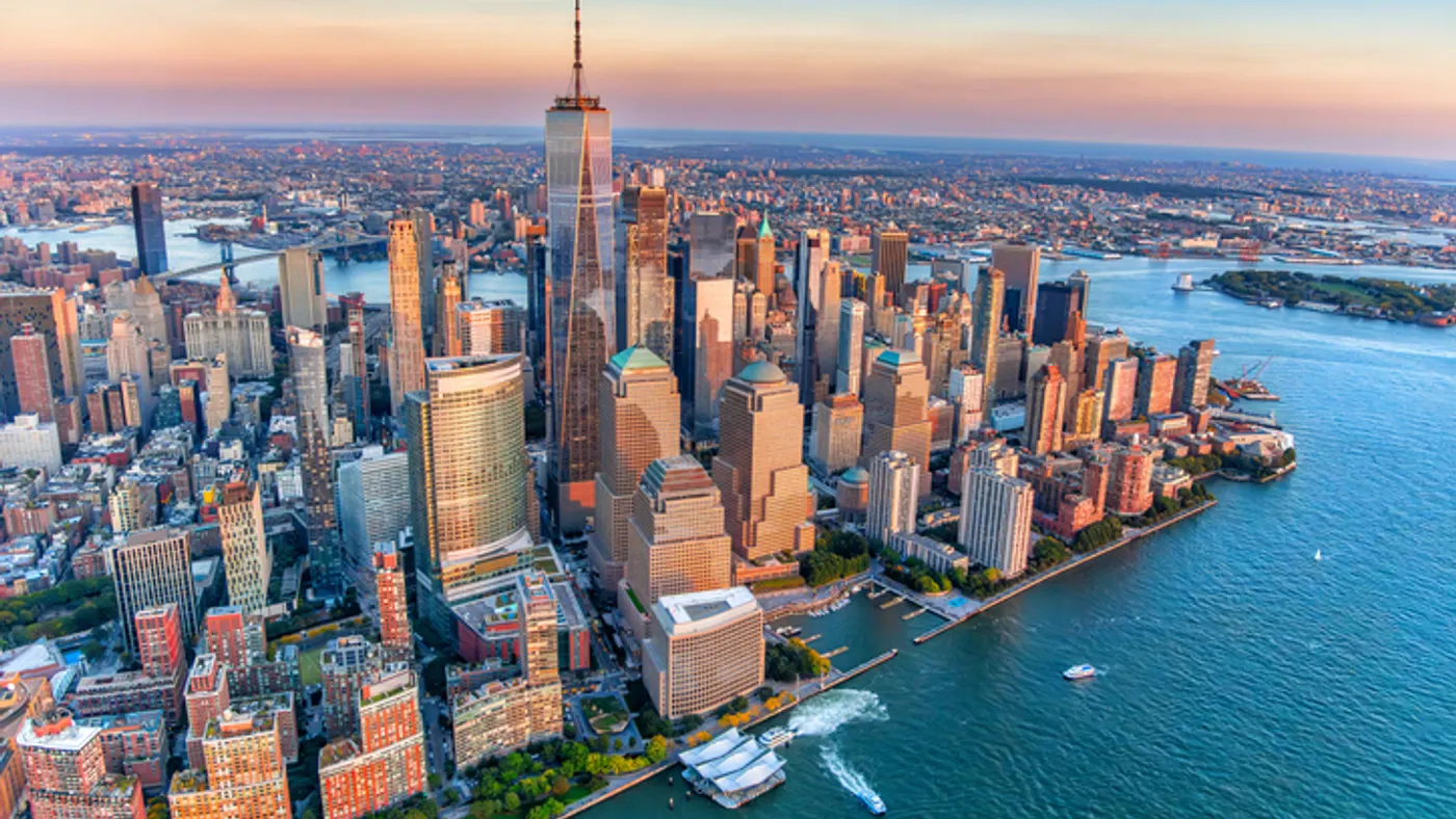 An aerial view of a city on the water.