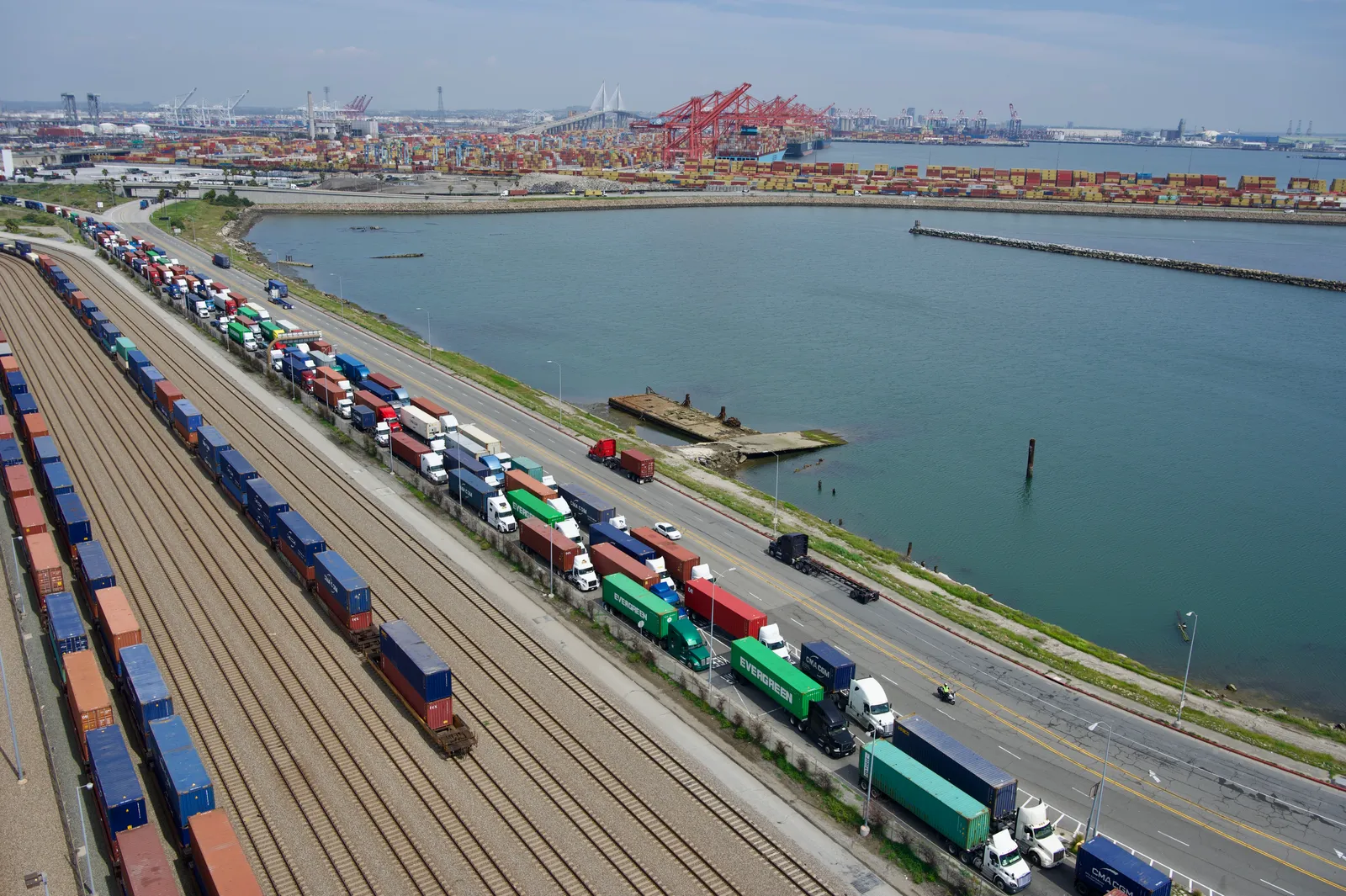 Trucks line up to enter the Fenix Marine Terminal at the Port of Los Angeles on Friday, March 17.