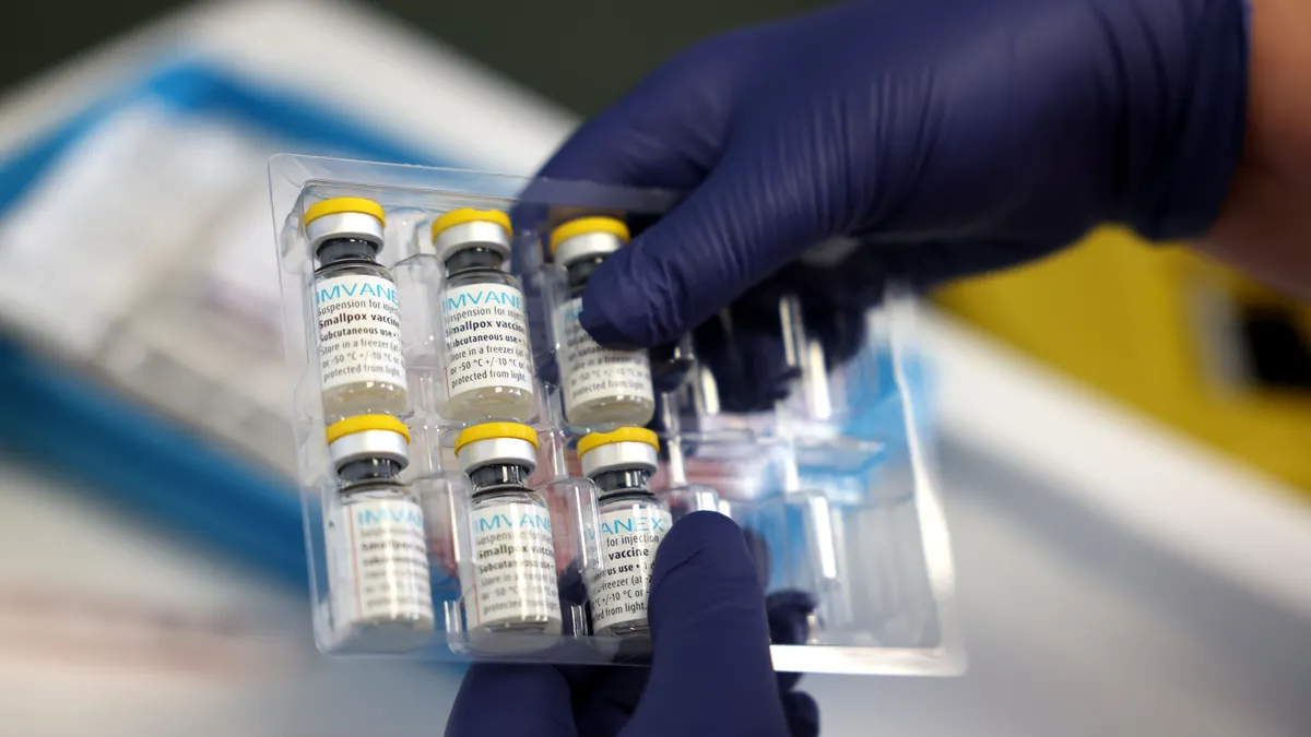 A medical professional prepares a dose of the monkeypox vaccine on July 23, 2022 in London, England.