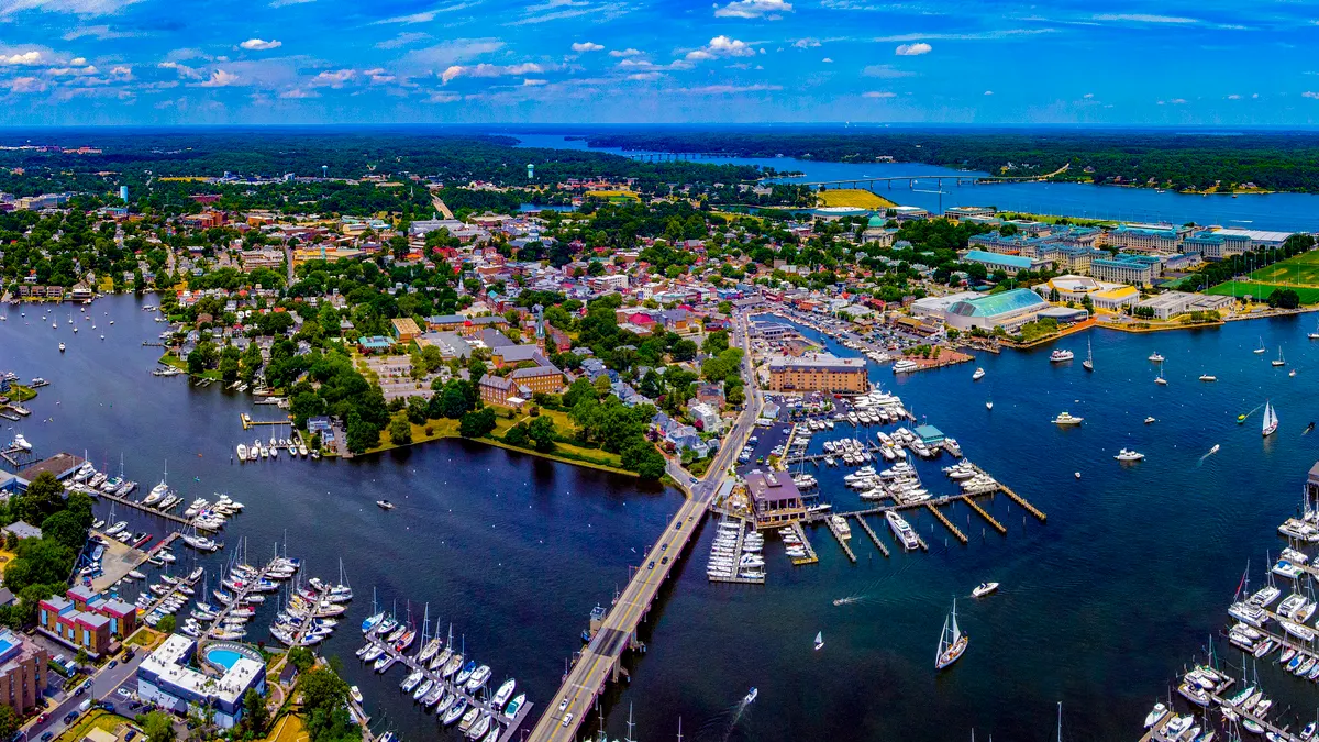 An aerial view of a city by the water.