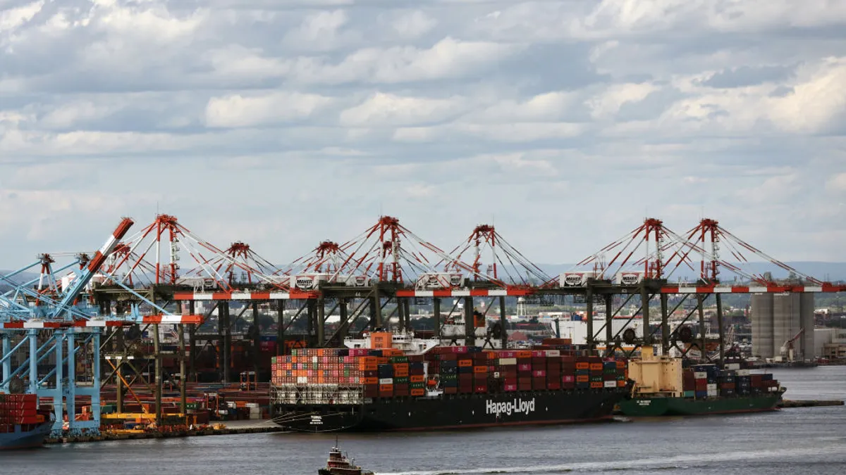 Shipping containers sit stacked in a port on June 09, 2022 in Bayonne, New Jersey.