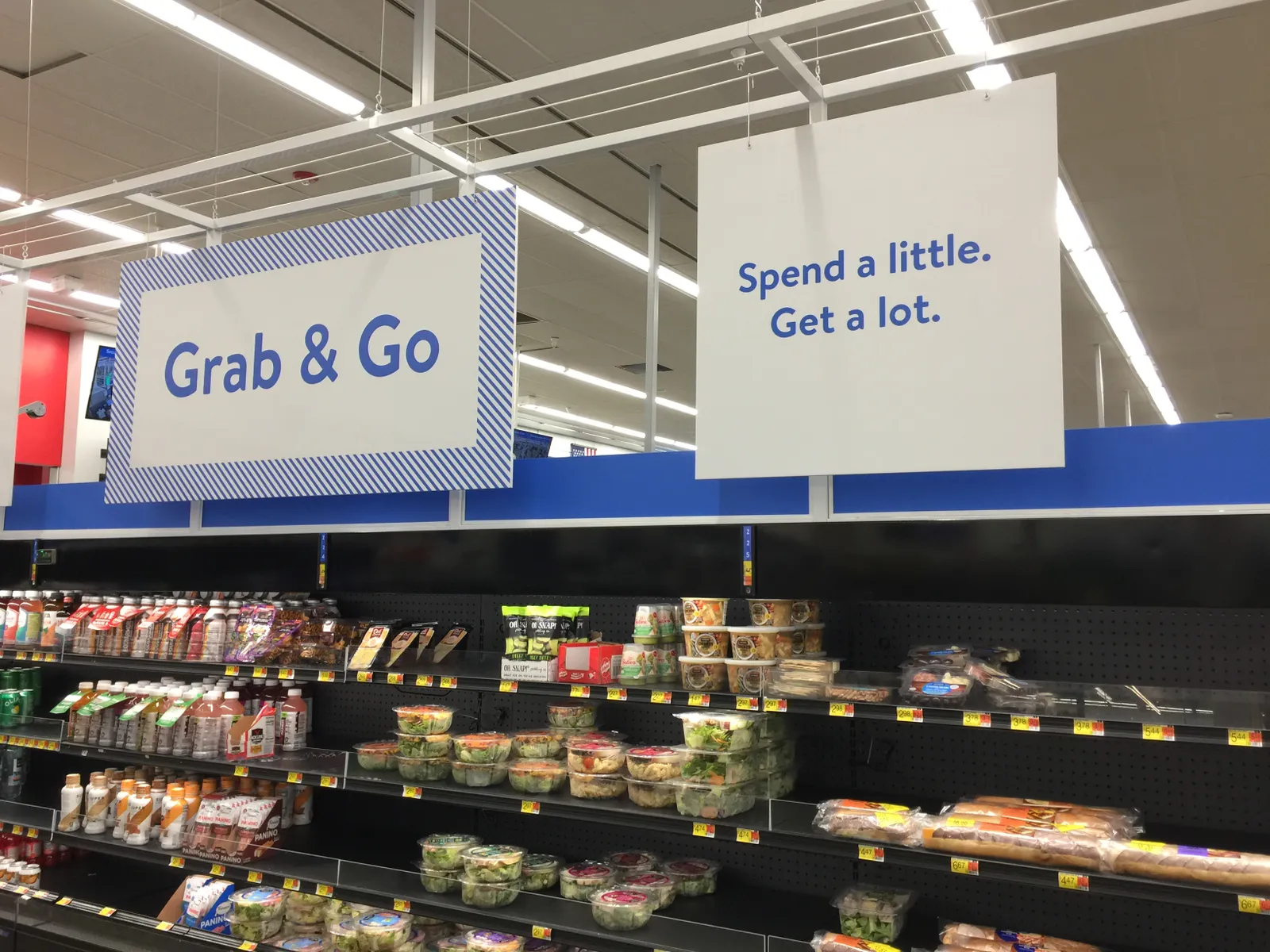 Grab and go sign at a store.