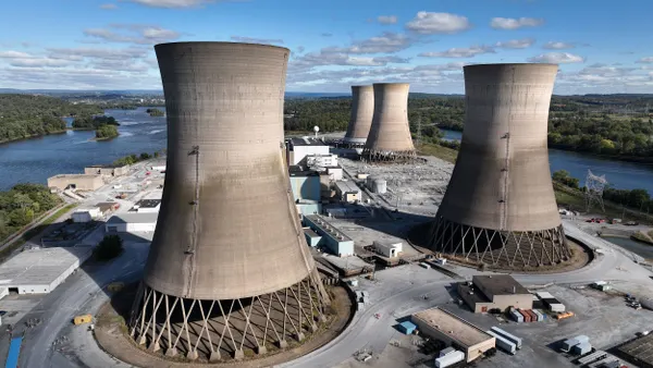 An aerial view of a nuclear plant next to a river