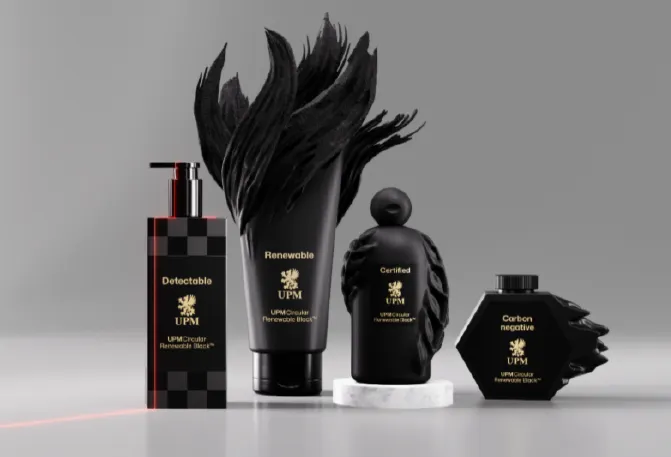 Four containers of health and beauty products with packaging made from black plastic and UPM branding in gold lettering.