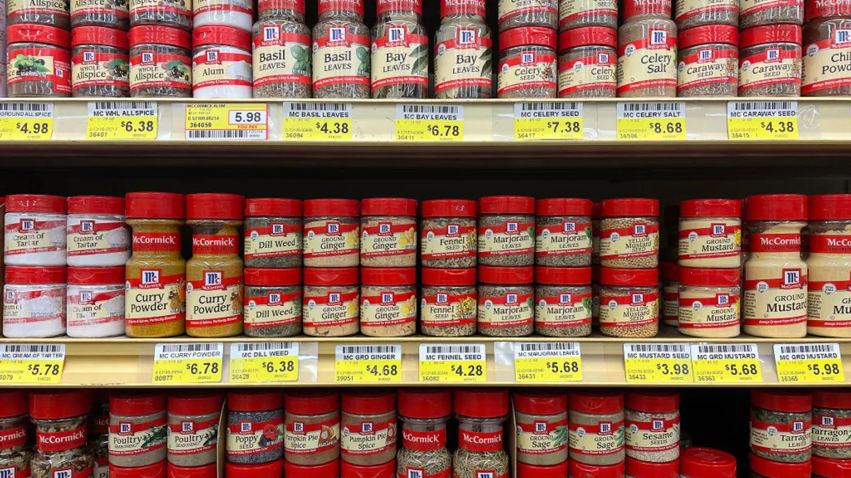 McCormick spices displayed on a supermarket shelf.