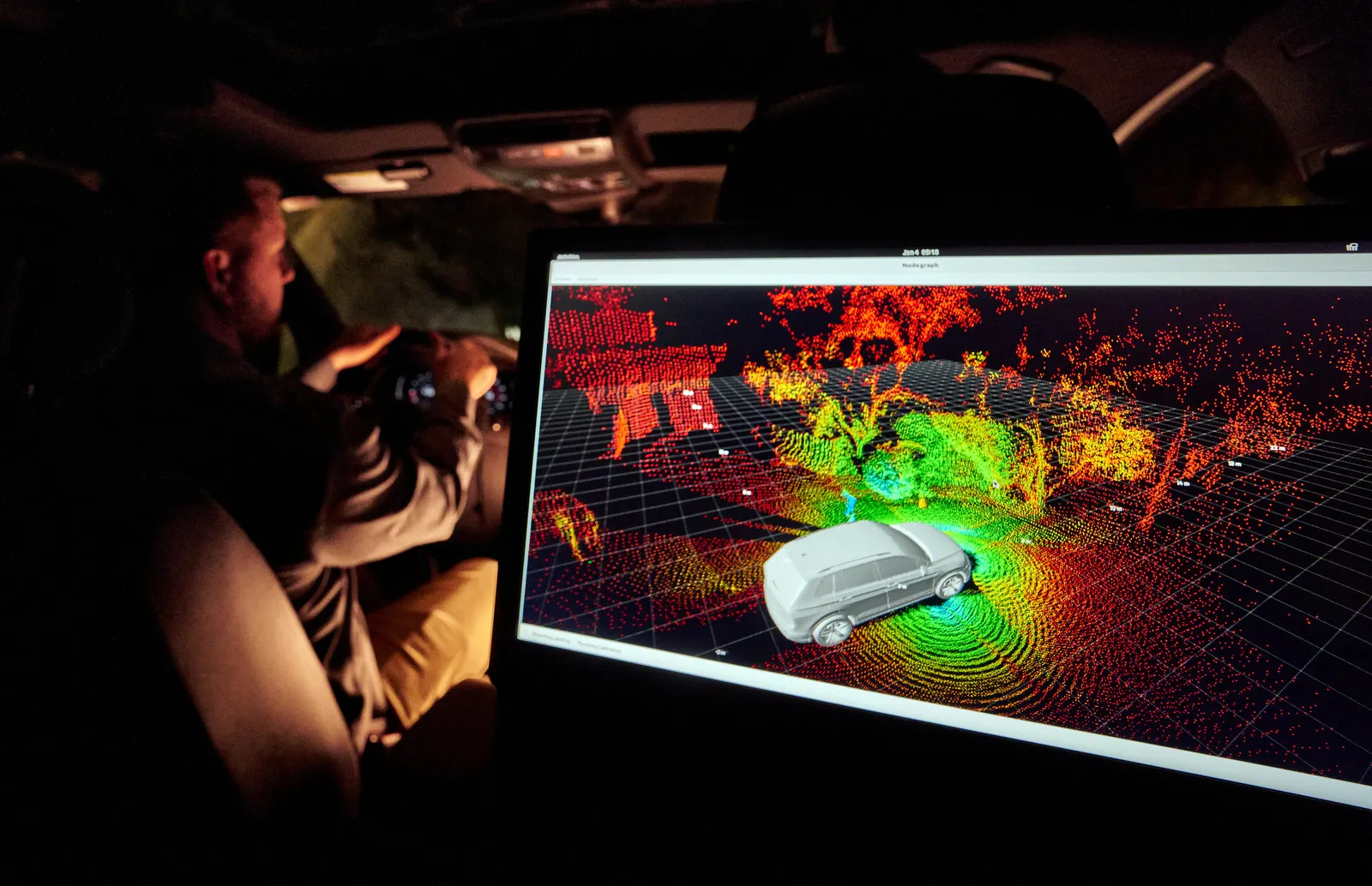 A screen displays what MicroVision lidar unit sees at night, with the help of software, as part of a safety system or autonomous driving.