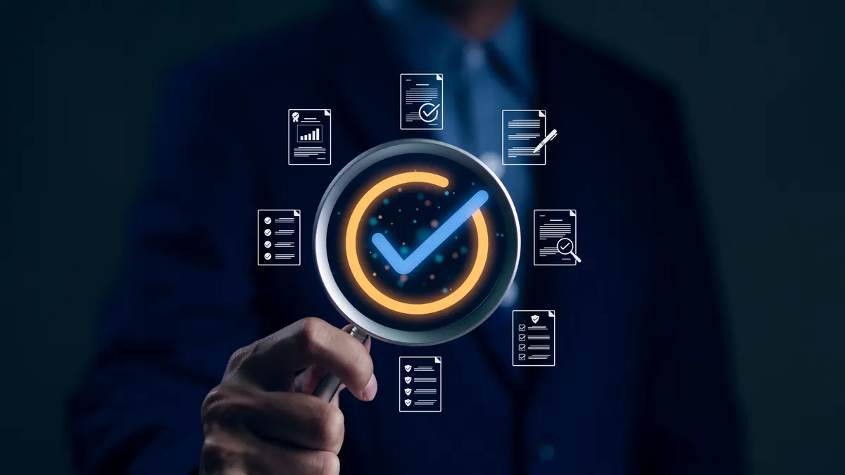 Person holding a magnifying glass focusing standard quality control certification assurance guarantee symbol.