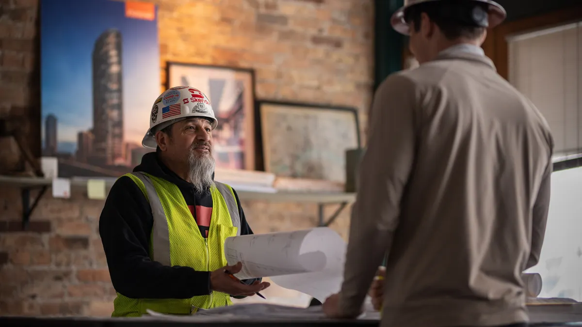A seasoned professional gives advice to an early career worker.