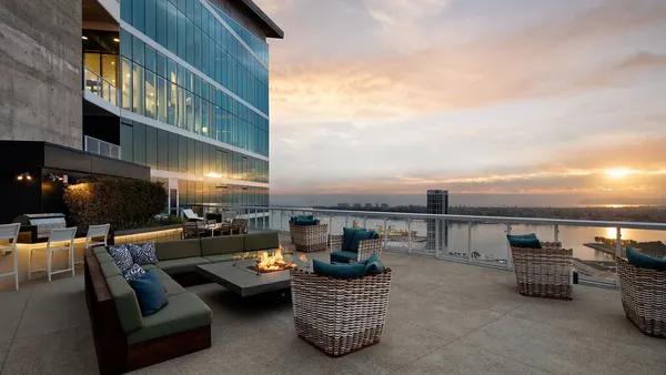 An outdoor lounge area with couches.