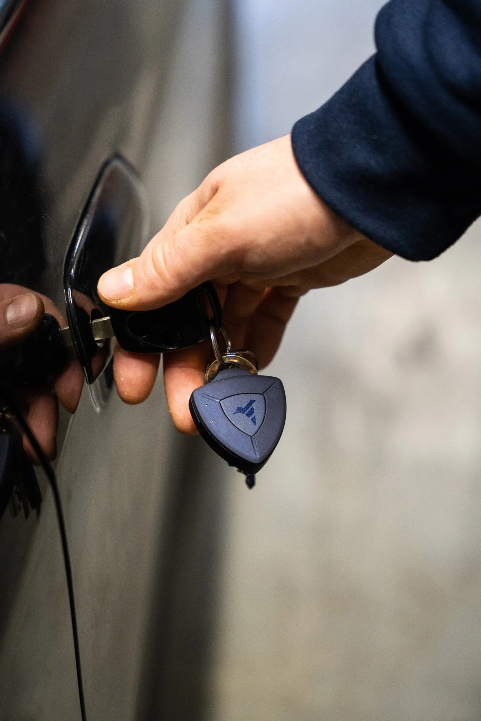 A staged photo of AirBolt's GPS tag.