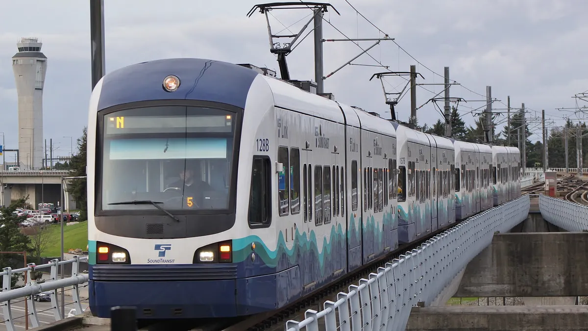 A train approaches the station.