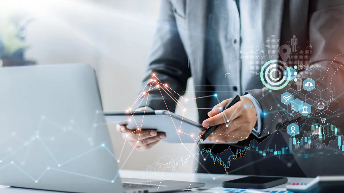 Businessman using tablet on global network connection