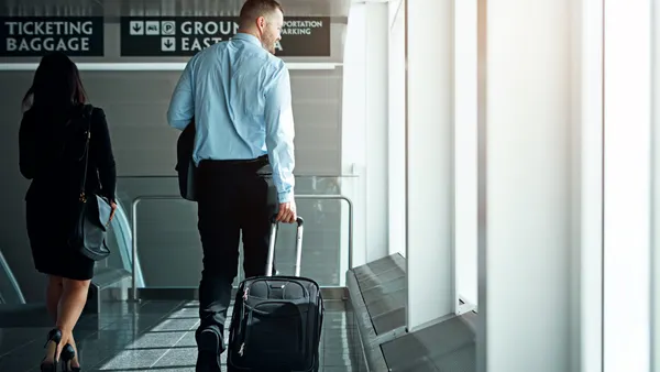 Travel, suitcase or luggage with business man in airport walking to gate