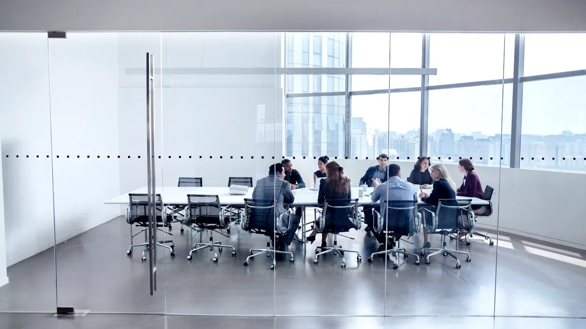 Colleagues at business meeting in conference room