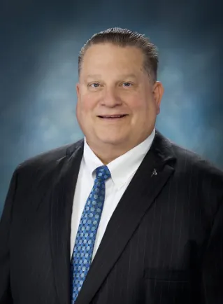 FedEx executive John Smith.