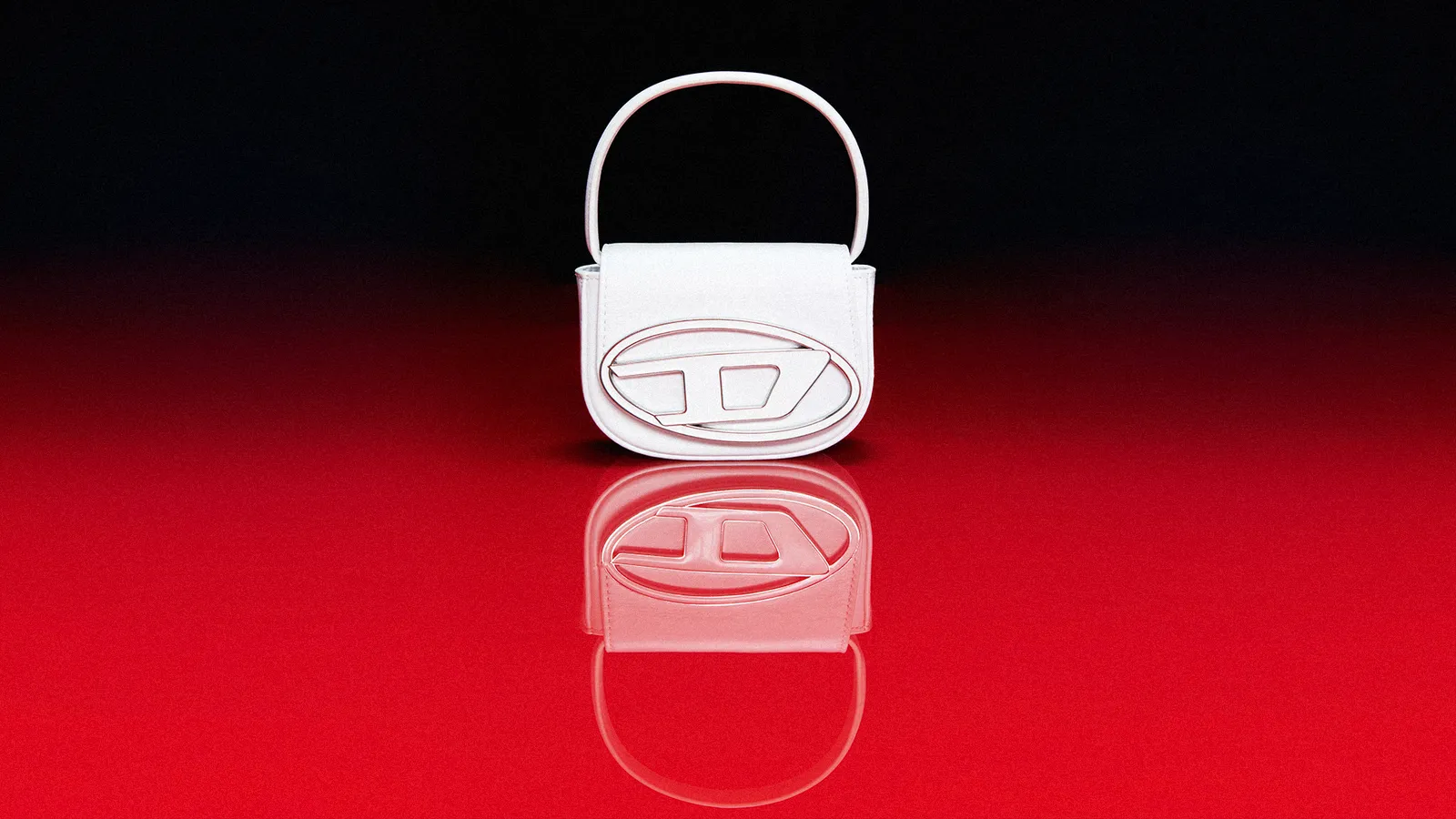 A white handbag sits against a red background.