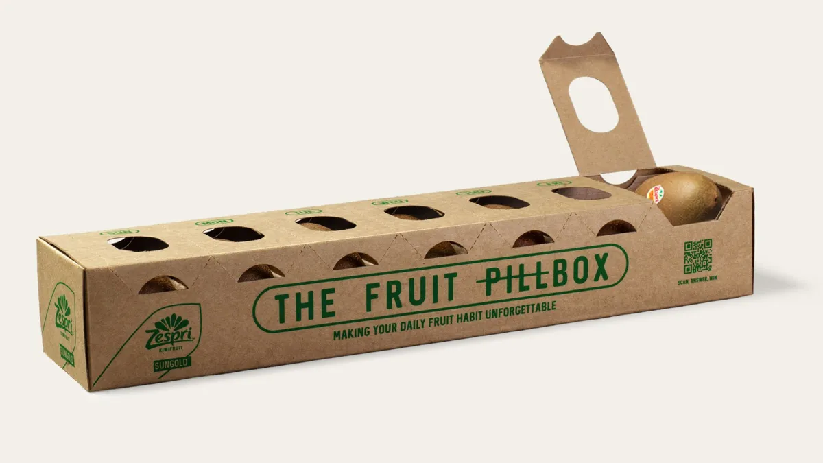 A long, fiber-based box resembling a pillbox that holds seven kiwis, one for each day of the week.