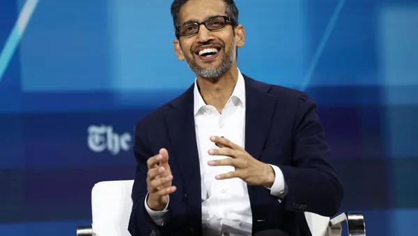 Google CEO Sundar Pichai in a conference setting
