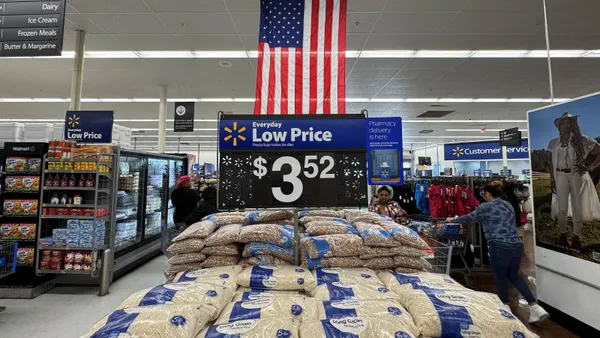Bags of beans and rice are displayed at a Walmart store.