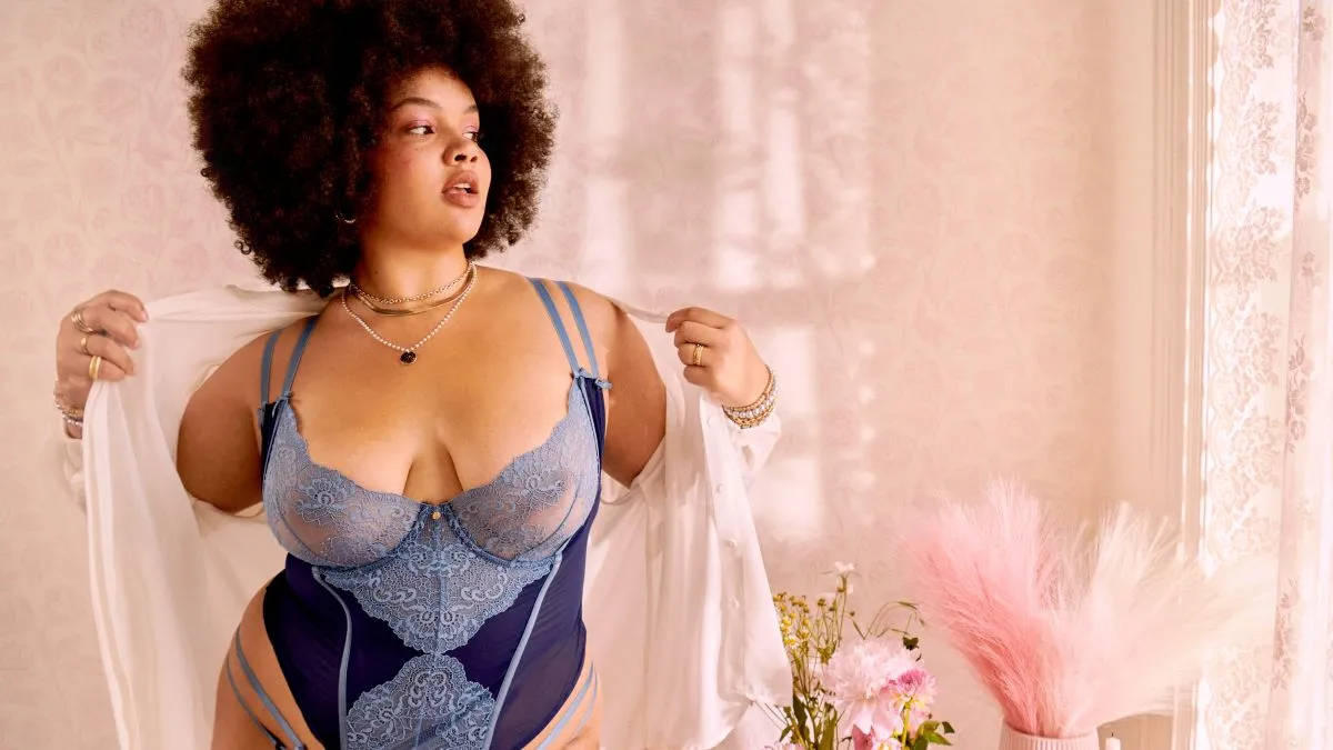 A person is pictured wearing Adore Me lingerie.