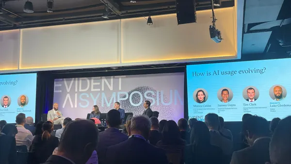 A panel of IT executives speak during the Evident AI Symposium in New York City on Oct. 21, 2026.