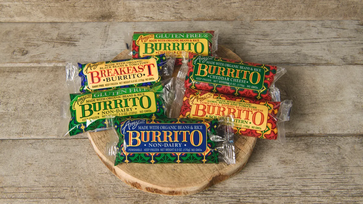 A set of packaged burritos from Amy's Kitchen.