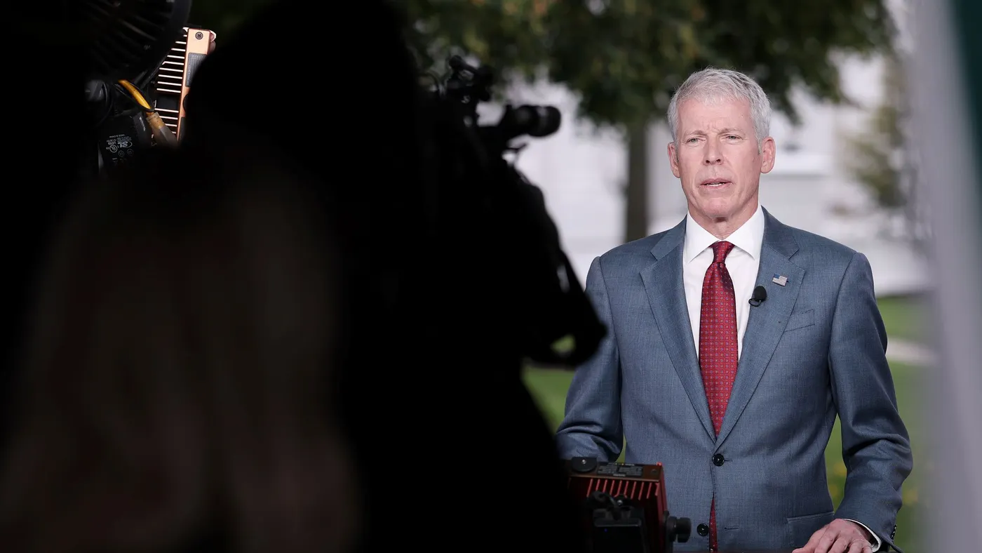 U.S. Energy Secretary Chris Wright speaks during a television interview outside of the White House