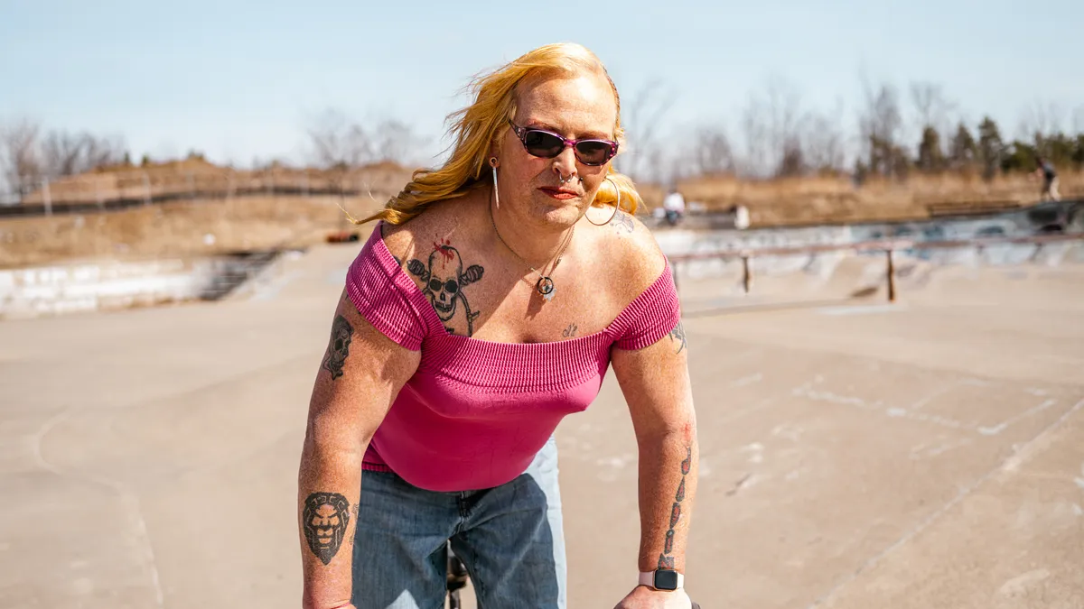 Transgender woman practices BMX cycling