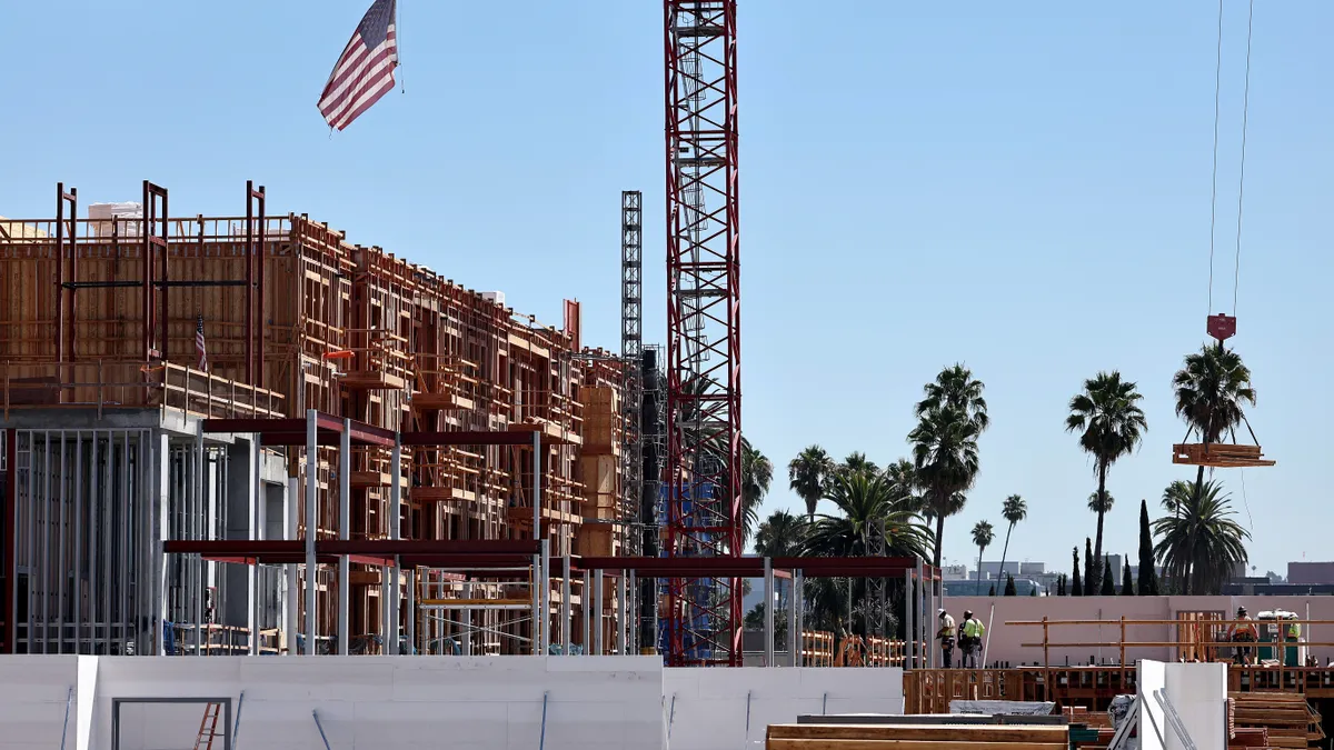 Construction continues on a mixed-use apartment complex that will hold more than 700 units of housing and 95,000 square feet of commercial space on August 20, 2024 in Los Angeles, California.