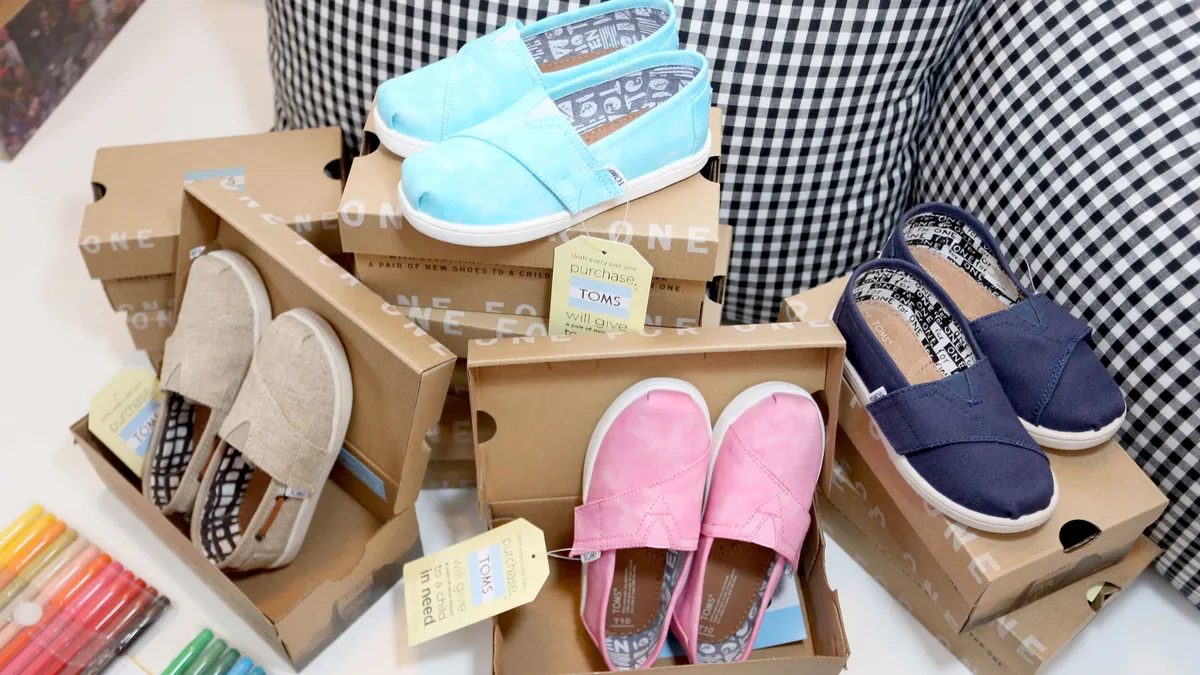 Toms shoes are pictured in a store display.