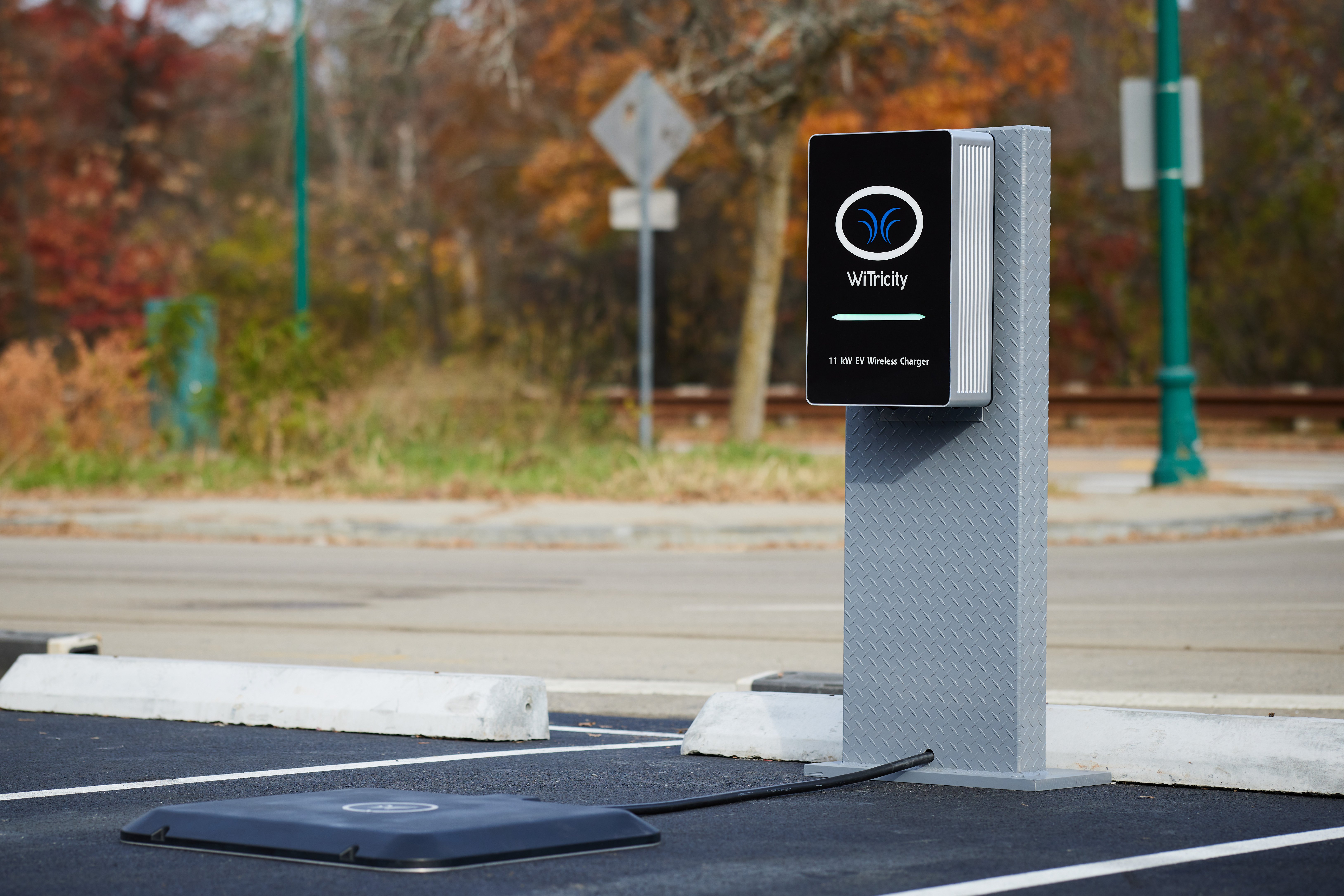 Photo of WiTricity wireless electric vehicle charging pad.