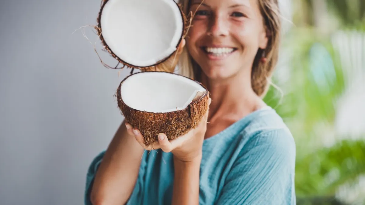 Woman with coconut bowls