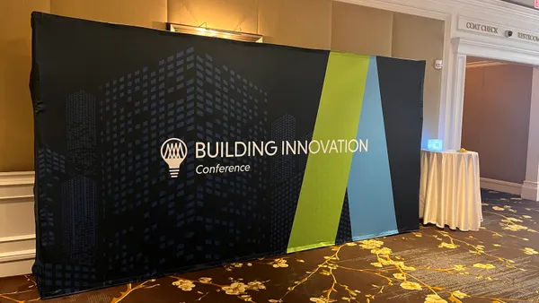 A Building Innovation Conference sign