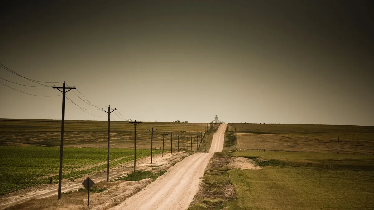 Image of a dusty road.